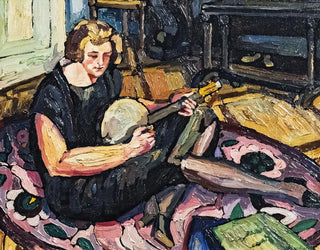 Georges Gaudion - Luce on the banjo in the living room in Rabastens.webp