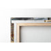 Detail of the back of the stretched canvas with wooden frame and hanger