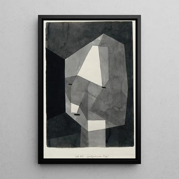 Tête grossièrement taillée - Paul Klee — framed artwork on a wall