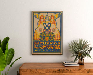 Exhibition poster – Sint Lucas, 1916 – Albert Hahn, framed above a wooden sideboard, between plants.