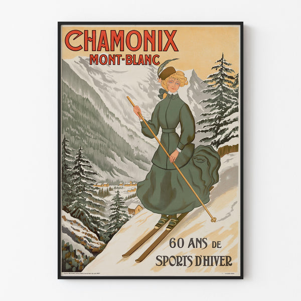 Vintage Chamonix poster, 60 years of winter sports, displayed in a thin frame on a light wall.