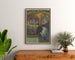 Vintage Grottes de Bétharram poster, framed above a wooden dresser between plants.