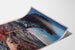 Vintage Hyères poster, shown on a curved sheet, viewed in perspective.