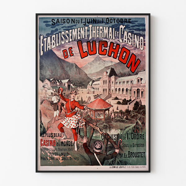 Vintage Luchon poster, casino and spa, displayed in a thin frame on a light wall.