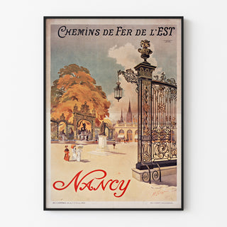 Manifesto vintage Nancy, Chemins de fer de l’Est, esposto in una cornice sottile su una parete chiara.