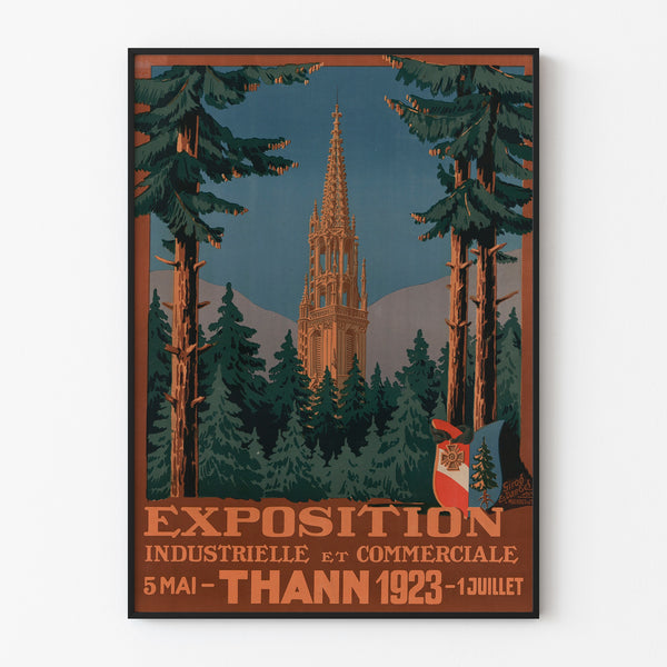 Vintage Thann industrial exhibition poster, displayed in a slim frame on a light wall.