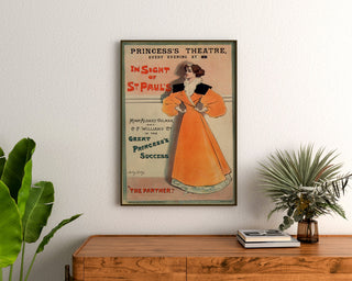 Vintage poster The Panther, Princess’s Theatre, framed above a wooden dresser, flanked by plants.
