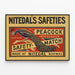 Vintage-Poster Nitedal's Safeties mit Pfau - Retro-Wanddekoration — gerahmtes Bild an der Wand